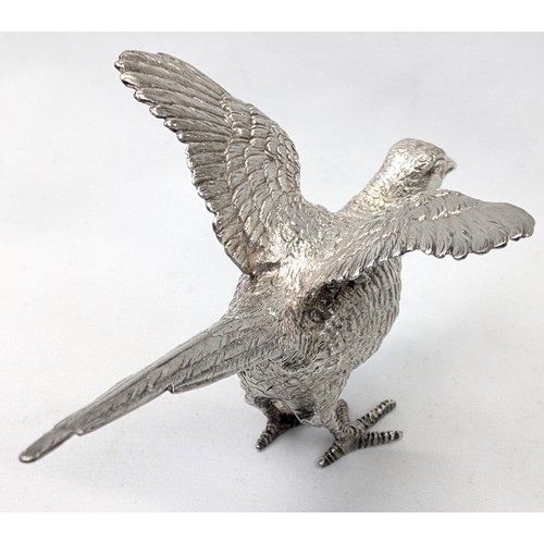 1024 - A pair of superb quality cast silver pheasants by Asprey & Garrard, each marked for London 2000 by A... 