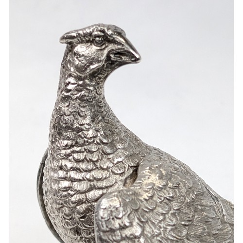 1024 - A pair of superb quality cast silver pheasants by Asprey & Garrard, each marked for London 2000 by A... 