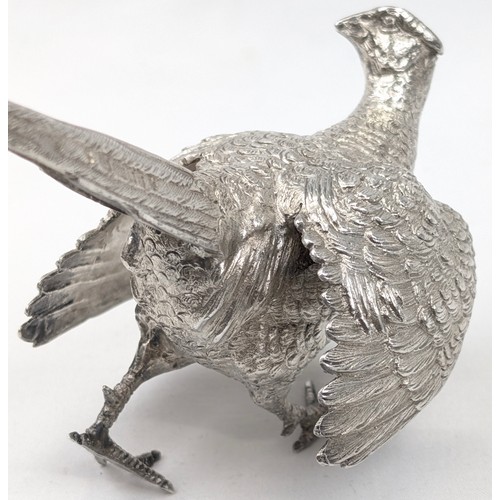 1024 - A pair of superb quality cast silver pheasants by Asprey & Garrard, each marked for London 2000 by A... 