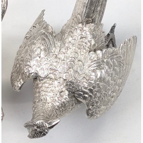 1024 - A pair of superb quality cast silver pheasants by Asprey & Garrard, each marked for London 2000 by A... 