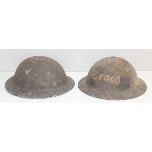 1449O - 4 assorted WW2 period British military Brodie helmets, 1943 dated brass shell case etc