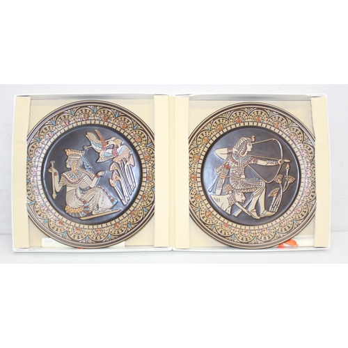 1681 - A pair of unusual Denby limited edition plates decorated with Egyptian related designs, presented in... 