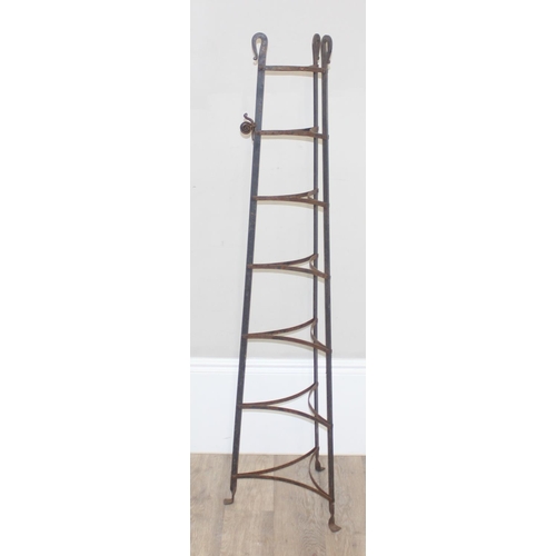 299E - 2 items to include a 4 tier veg stand and a 7 tier wrought iron pot stand, largest approx 144cm tall