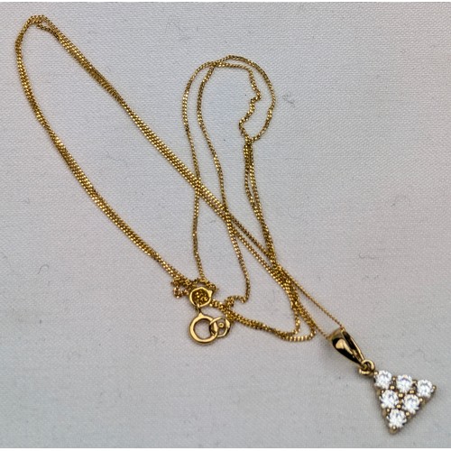 1171 - A vintage 14ct gold pendant on fine 14ct gold chain, the pendant set with white stones in a triangul... 