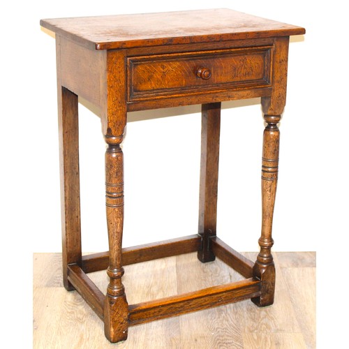 42 - An antique oak side table with single drawer, approx 53cm wide x 38cm deep x 73cm tall