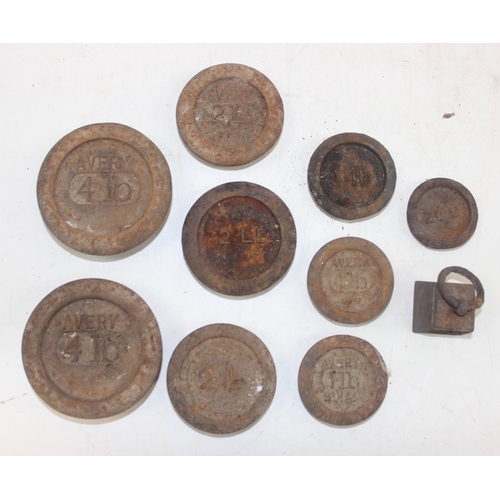 1693 - Qty of assorted vintage iron weights and vintage pulleys etc