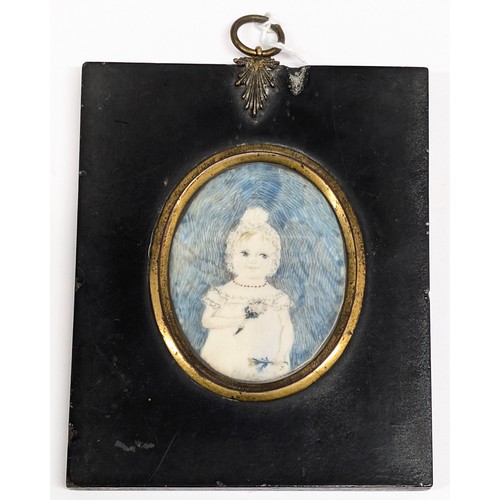 1492B - An early 19th century portrait miniature depicting a young girl with flowers, seemingly unsigned, va... 