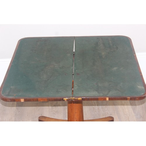 40 - A Victorian Rosewood card table with foldover top and green baize lined interior, approx 92cm wide x... 