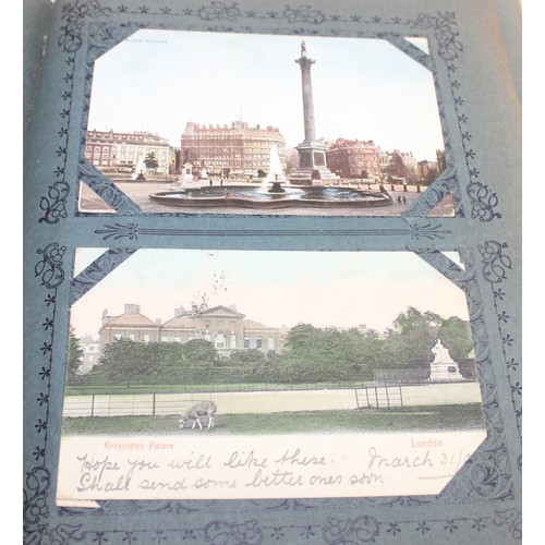 564 - An antique postcard album and contents, mainly scenes of London and UK places, some humorous and ani... 