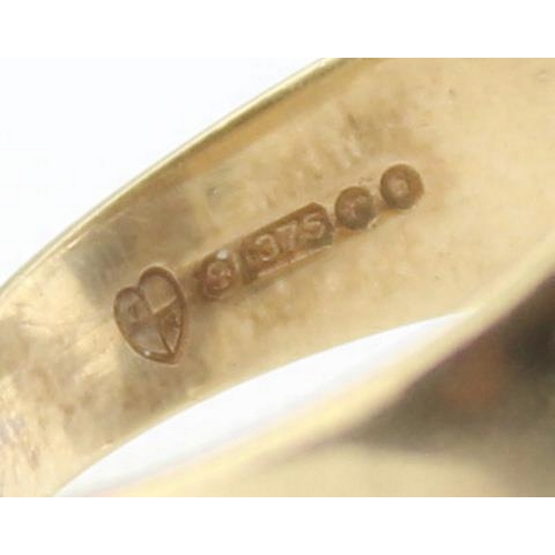 1185 - A 9ct gold ring shank to hold a gold full sovereign coin, marked for London 1972, approx size S, app... 