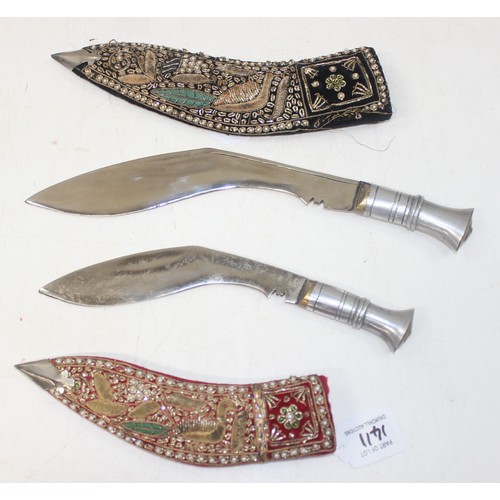 1411 - 2 alloy-hilted Kukri knives, 1 with jewelled-red velvet scabbard, the other longer and with jewelled... 