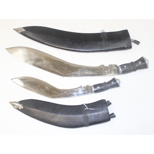 1412 - 2 vintage Kukri knives with leather covered sheaths, longest approx 59cm