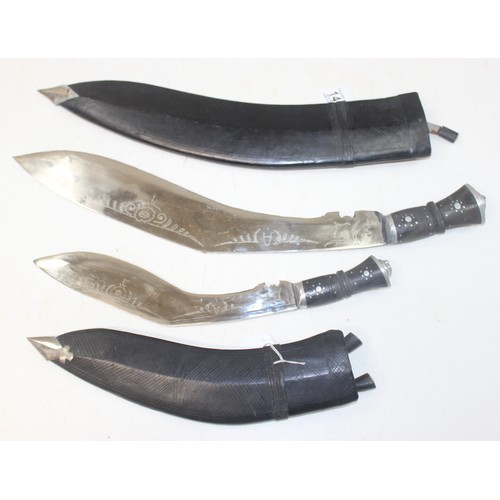 1412 - 2 vintage Kukri knives with leather covered sheaths, longest approx 59cm