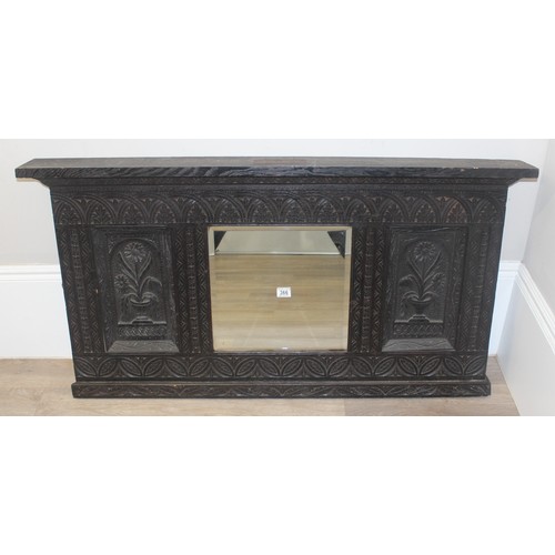 366 - A 19th century Gothic Revival carved oak over-mantel or wall mirror, a projecting cornice over friez... 