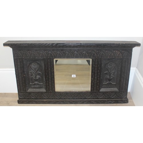 366 - A 19th century Gothic Revival carved oak over-mantel or wall mirror, a projecting cornice over friez... 