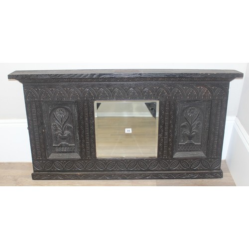 366 - A 19th century Gothic Revival carved oak over-mantel or wall mirror, a projecting cornice over friez... 