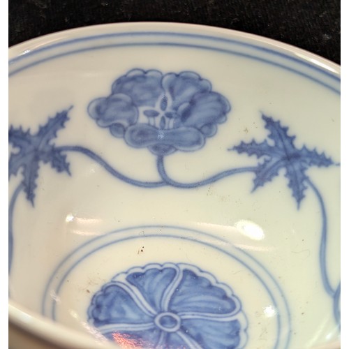 1455 - A Chinese blue & white porcelain tea bowl decorated with floral motifs, Chenghua (1464-1487) 6 chara... 