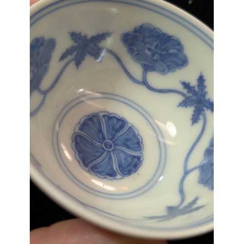 1455 - A Chinese blue & white porcelain tea bowl decorated with floral motifs, Chenghua (1464-1487) 6 chara... 