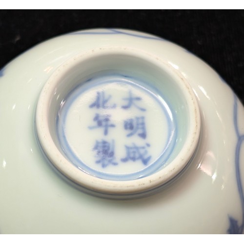 1455 - A Chinese blue & white porcelain tea bowl decorated with floral motifs, Chenghua (1464-1487) 6 chara... 