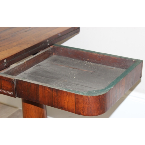 119 - A Victorian Rosewood card table with fold over top and green baize lined interior, approx 92cm wide ... 