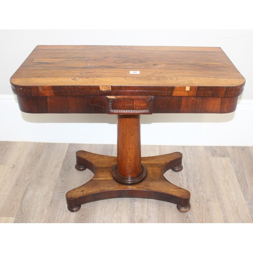 119 - A Victorian Rosewood card table with fold over top and green baize lined interior, approx 92cm wide ... 