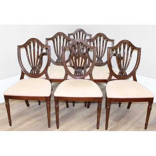 36 - A set of 6 Hepplewhite style mahogany dining chairs with shield backs and cream upholstery, 4 dining... 