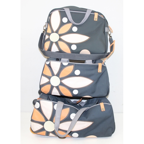 200 - 3 modern Radley travel bags or suitcases, the largest approx 58cm wide