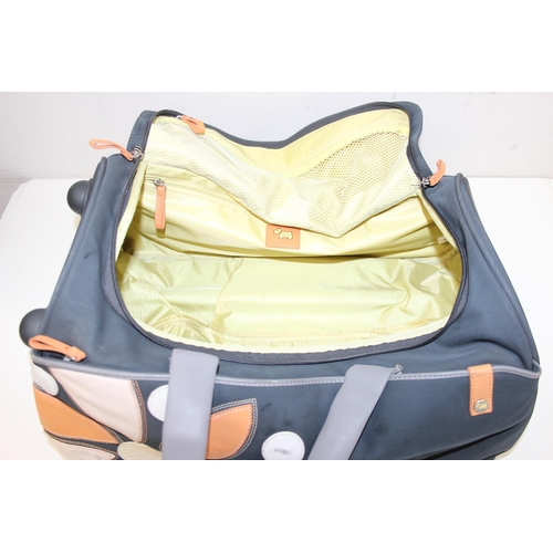 200 - 3 modern Radley travel bags or suitcases, the largest approx 58cm wide