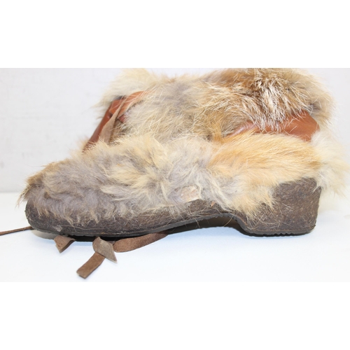 201 - A pair of vintage Inuit style leather and fur boots by Calidum of Italy, no size and a vintage fur m... 