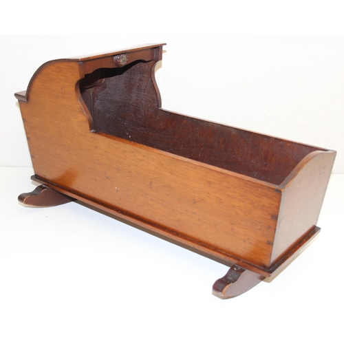 270 - An antique scratch built mahogany dolls cradle, likely 19th century, approx 55cm wide