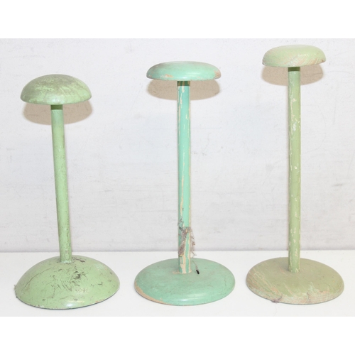 272 - 8 assorted vintage distressed painted wooden hat or wig stands, green painted finish, the largest ap... 