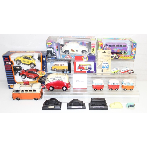 604 - Qty of assorted Volkswagen and VW Camper related collectables to inc many boxed diecast vehicles, to... 