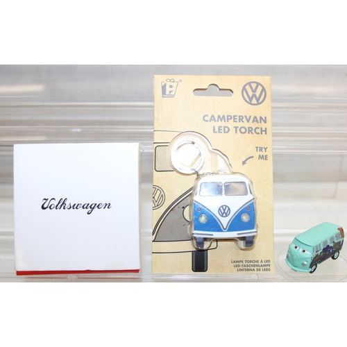 604 - Qty of assorted Volkswagen and VW Camper related collectables to inc many boxed diecast vehicles, to... 