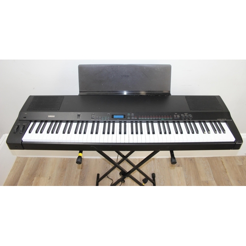 700 - Yamaha P-150 electric piano or keyboard with stand and seat