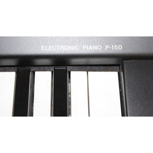 700 - Yamaha P-150 electric piano or keyboard with stand and seat