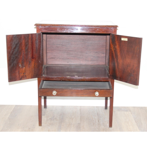 170 - An early 20th century mahogany side cabinet or pot cupboard with drawer by Spillman & Co of London, ... 