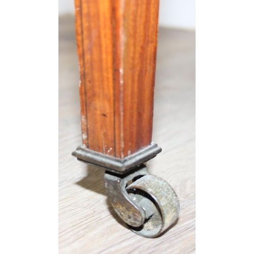 177 - An antique mahogany wash stand with grey marbles top, the 2 doors with inlaid details, brass ring ha... 