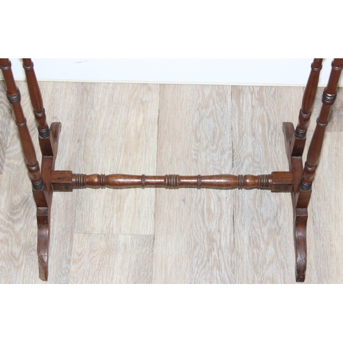 56 - An Edwardian mahogany side table with turned supports, approx 51cm wide x 35cm deep x 75cm tall