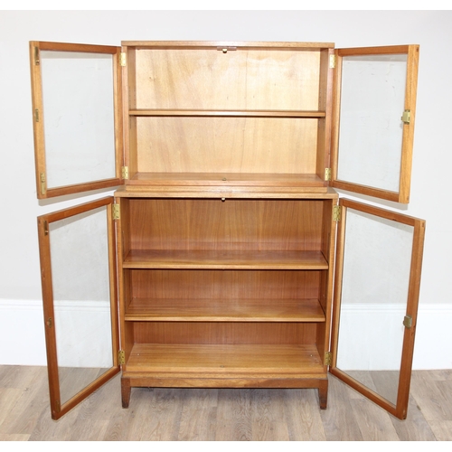 39 - Gordon Russell of Broadway, a 1955 dated glazed 2 section bookcase with adjustable shelves, marked v... 