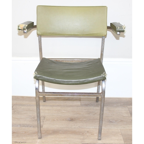 172 - A pair of retro green vinyl and chrome framed armchairs, seemingly unmarked, approx 60cm wide x 77cm... 