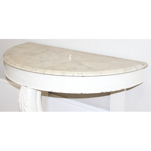 162 - An antique demi-lune side table or wash stand with white painted base and marble top, approx 91cm wi... 