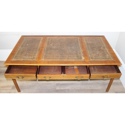 160 - An antique style desk or library table with inset gilt tooled leather top, 3 drawers to one side and... 