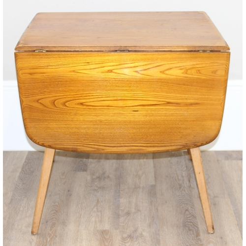 25 - Luciano Ercolani (1888-1976) for Ercol, an elm and beech drop leaf table, believed to be a model 383... 