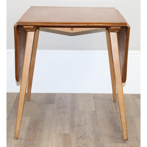 25 - Luciano Ercolani (1888-1976) for Ercol, an elm and beech drop leaf table, believed to be a model 383... 