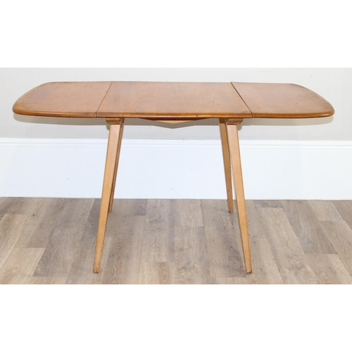 25 - Luciano Ercolani (1888-1976) for Ercol, an elm and beech drop leaf table, believed to be a model 383... 