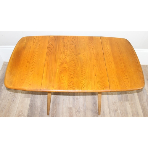 25 - Luciano Ercolani (1888-1976) for Ercol, an elm and beech drop leaf table, believed to be a model 383... 