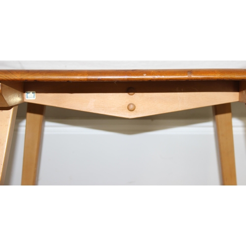 25 - Luciano Ercolani (1888-1976) for Ercol, an elm and beech drop leaf table, believed to be a model 383... 