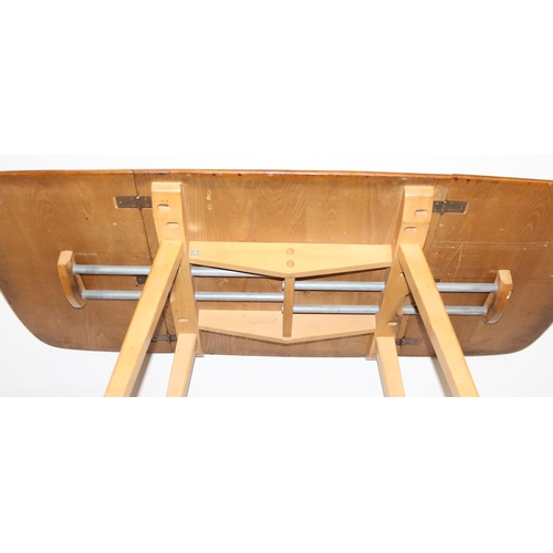 25 - Luciano Ercolani (1888-1976) for Ercol, an elm and beech drop leaf table, believed to be a model 383... 