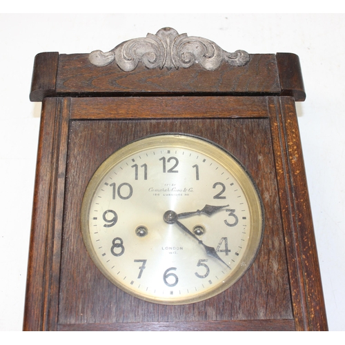 1321 - 2 vintage wooden-cased wall clocks, largest approx 70cm