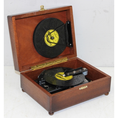 1418 - A vintage Thorens of Switzerland musical box with a large qty of metal discs and a clockwork movemen... 